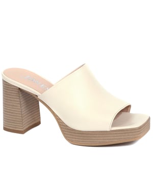 Tap into the unstoppable 90s trend with Dominica, the block heel mule that has all the nostalgic flare you need this season. Poised upon a chunky block wooden platform for added edge, these are the perfect pairing to cropped jeans, skirts or dresses.