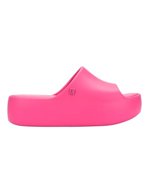 Elevate the footwear game with the stylish and versatile Melissa Free Platform Slide, a style that won't let you down! The sustainable and modern Melissa Free line has delivered products that are EVA-based, lightweight, and in touch with current fashion trends. The slide has a robust design, but is unbelievably lightweight and comfortable, so much so that you will want them on ythe feet all day, every day.