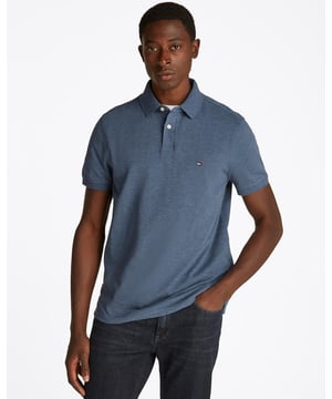 With its classic cut and understated styling, this pique polo will go the extra mile in your smart-casual wardrobe. Highlights• Stretch organic cotton pique• Polo collar• Two-button placket• Tommy Hilfiger branding• Tommy Hilfiger flag embroidery on chest Shape & fit• Regular fit Composition & care• 96% organic cotton, 4% elastane StyleMW0MW17770