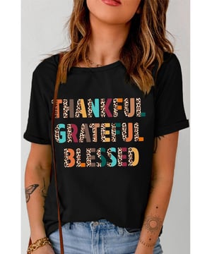 Black crewneck T
  shirt
  Thankful Grateful Blessed message with leopard details
  Stylish and comfortable
  Suitable for various occasions
  Check out our size chart for the perfect fit
Material: 62% Polyester 32% Cotton 6% Elastane