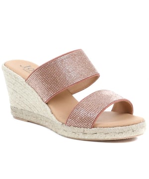 Does it get more summery than wedge sandals? We think not. The Amabelle mule sandals have been made in Spain with supple leather straps and shaped with an open-toe silhouette that's primed for the summer sun. The espadrille inspired jute sole is classic in its own right, so opt to wear them with timeless summer staples like a floating maxi dress or palazzo pants.