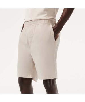Men's Lacoste Organic Cotton Shorts.- Loose, relaxed fit: Relaxed style.- Elasticated waistband with drawstring: Adjustable, for tailored comfort.- Two pockets on back: Practical and eye-catching.- Crocodile on back pocket: Signed Lacoste.- Organic cotton: Grown without GMO or chemical products. Material: 100% Cotton. Ref: GH7862G7A.