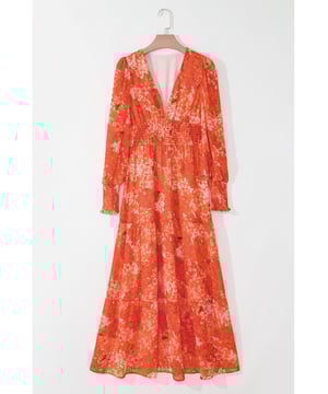 Oranje Boho Bloemen Bisschop Mouw V-Hals Laagjes Maxi Jurk  
Rimpel laagjes ontwerp  
Charmante bloemenprint  
Vleiende V-hals  
Elegante bisschop mouwen  
Beschikbaar in verschillende maten  
Raadpleeg de maattabel voor nauwkeurige maatvoering  
Materiaal: 100% Polyester