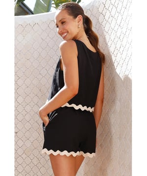 Black Ricrac Trim Tank Top Elastic Waist Shorts Set
  Unique and delicate ricrac detail
  Vest and shorts can be worn together or separately
  Contrast trim creates a color block effect
  Breathable lightweight and comfortable material
  Perfect for your summer wardrobe