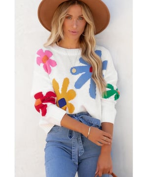 Klassisches Rundhalsausschnitt-Design  
Lange Ärmel für zusätzliche Wärme  
Lebhaftes Blumenmuster  
Hochwertiger Strickstoff für Komfort  
Erhältlich in den Größen S bis 2XL  
Hohe Elastizität für einen perfekten Sitz  
Material: 55% Acryl, 45% Baumwolle