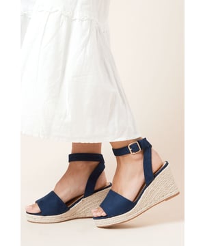 Clever details and good design make the Rebekah's the perfect summer footwear. Boasting espadrille-like flatform heels for added comfort and fastened with a side buckle for ease of wear. Style: Wide Fit Rebekah Peep Toe Wedges.  Ideal for: Casual.  Fit: Wide Fit.  Heel height: Over 9cm/3.5".