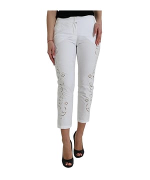 Producto: Pantalones Elegantes Blancos de Cintura Media Acampanados  
Marca: Dolce & Gabbana  
Material: 90% Algodón 10% Viscosa  
Color: Blanco  
País de Origen: Italia  
Cierre con cremallera  
Detalles con logo  