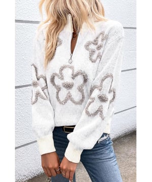 Elegant white sweater with contrasting flower pattern
  Half
  zip design is unique and flexible
  Stand neck provides a stylish and warm look
  Perfect for adding a chic twist to your casual outfits
  Available in a range of sizes
  Made of high
  quality elastic material for a comfortable fit