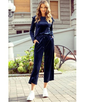 Navy blue solid velvet two
  piece pants set
  Includes a ruffled long sleeve top
  Cropped pants
  Suitable for both dressy and casual occasions
  High elasticity for a comfortable fit
Material: 95% Polyester 5% Elastane