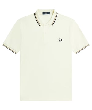 The Twin Tipped Fred Perry Polo Shirt by Fred Perry is a short sleeved polo shirt that has been made from Fred Perry's classic cotton piqué, in a contemporary adaptation of Fred's famous streamlined fit. Available in a diverse range of colourways - each with their own unique story. Featuring the signature Fred Perry wreath logo to the chest and twin tipping to the collar and cuffs.