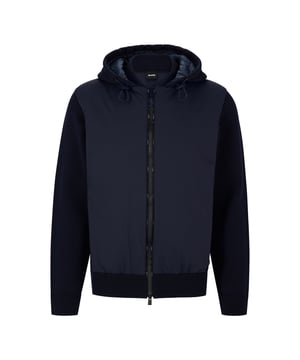 PERFORMANCE - nylon hybrid zip jacket - hooded - forward moved side seams with zip pockets - nylon back yoke - elasticated cord around hood opening - BOSS reflective piping at placket - water stop zipper trims