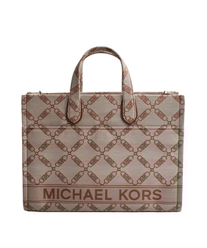 The Michael Kors Gigi tote is the perfect complement to virtually any look thanks to its neutral-toned jacquard chain and logo pattern. The large rectangular silhouette is the perfect size to carry just your everyday essentials and includes a versatile crossbody strap. Inside, there are convenient pockets for your keys and phone.

 Details:
 - Accessory Type: Tote Bag.
 - Material: Synthetic material with the repeated Empire logo.
 - Interior details: Back zipper pocket, 2 front pockets.
 - Exterior details: Front pocket with magnetic closure.
 - Handles: Double.
 - Includes shoulder strap and storage bag.
 - Closure: No closure.

 Each of Michael Kors' accessories collections boasts a strong identity, offering a fresh mix of timeless trends, colors, and silhouettes, combined with urban style and attitude. Each women's tote bag designed by Michael Kors is an affordable luxury with a touch of modern, unexpected, and comfortable glamour, offering a piece for every occasion.
 Measures: 39.4 cm x 29.8 cm x 13.3 cm
 Composition: 53.2% Cotton, 46.8% Polyester
 Care:
Clean with a soft, dry cloth.
 Avoid prolonged exposure to the sun and humidity.
 Avoid contact with liquids and rough surfaces.