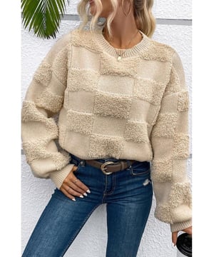 Suéter holgado de cuello redondo de sherpa a cuadros en pergamino  
Material de sherpa suave y acogedor  
Diseño clásico y cómodo de cuello redondo  
Mangas largas para días frescos  
Ajuste relajado con detalles de ribete  
Disponible en una variedad de tamaños  
Eleva tu estilo personal sin esfuerzo