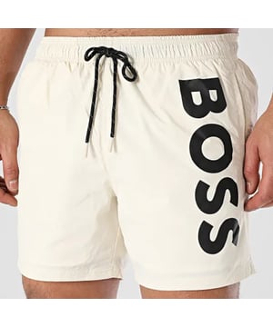 Elevate your summer wardrobe with these BOSS Men’s Quick-Dry Swim Shorts in a stylish light beige. Designed for both performance and style, these swim shorts are crafted from innovative quick-dry poplin fabric that ensures comfort whether you’re poolside or hitting the beach.

Key Features:

Premium Material: Made from high-quality poplin fabric with quick-dry technology to keep you comfortable and ready for your next adventure.

Modern Design: The light beige color offers a versatile, understated elegance that pairs perfectly with your casual summer looks.

Comfort & Fit: Designed with an ergonomic cut for a comfortable fit, these swim shorts allow for unrestricted movement, ideal for swimming, lounging, or water sports.

Durability: Built to last, these shorts maintain their shape and quality even after repeated use and exposure to water.

Attention to Detail: Subtle branding and refined details reflect the high standards of BOSS, ensuring you look as good as you feel.

Whether you’re enjoying a day at the beach, a pool party, or an active water sport session, these swim shorts are a must-have for the modern man. Upgrade your swimwear collection with a pair that combines luxury, functionality, and timeless style.