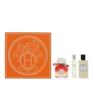 Hermes Twilly D'Hermes 3 Piece Gift Set features the elegant Eau De Parfum in two sizes (85ml and 15ml) along with a luxurious Body Lotion (80ml). The fragrance opens with the spicy warmth of ginger, complemented by the bright citrus notes of bitter orange and bergamot. The heart blooms with a rich floral blend of tuberose, orange blossom, and jasmine, creating a vibrant, feminine essence. The base is soft and sensual with creamy sandalwood and sweet vanilla, providing a warm, lasting finish. This set offers a complete, indulgent experience, allowing you to enjoy the captivating scent on your skin and throughout your day.