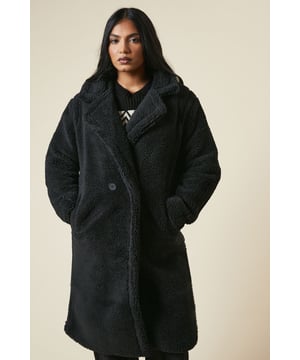 Luxurious borg fabric for ultimate cosiness
        Midi length for versatile styling
        Collared neckline adds a refined touch
        Double-breasted button fastening for a classic look
        Roomy pockets for practicality and warmth
    
    Wrap yourself in comfort and style with this borg collared midi coat from Dorothy Perkins. Perfect for the fashion-conscious woman in her 30s who values both trend and modesty, this coat is a versatile addition to your wardrobe. The cosy borg fabric provides warmth without compromising on style, making it ideal for casual outings and family gatherings. Style it over a patterned jumper and wide-leg trousers for a chic brunch look, or pair it with a midi dress and ankle boots for a baby shower. The midi length offers coverage and flexibility, allowing you to customise your look for various occasions. Whether you're running errands or meeting friends for coffee, this coat will keep you looking effortlessly put-together while braving the British weather.
