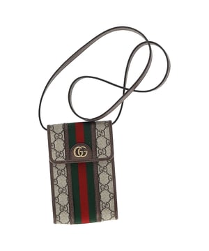 VINTAGE, RRP AS NEW
Elevate your on-the-go style with the Gucci Ophidia Flap Phone Holder Bag in elegant beige coated canvas. Featuring the brand's iconic GG Supreme pattern and the signature green and red Web stripe, this compact yet functional phone holder offers a luxurious way to carry your essentials. Designed with modern convenience in mind, it features a flap closure for easy access to your phone and other small items.

 Gucci Ophidia Flap Phone Holder Bag in Beige Coated Canvas

Condition: Excellent
Signs of wear: No retail tag, No visible sign of wear., 
Packaging: Dust bag
Color: Beige
Material: Canvas | coated/waterproof canvas
Size: One Size | One Size
Measurements: Width: 20; Height: 180; Length: 115; Handle drop: 500; Strap length: 1000
SKU: MRPPUGBBA459666M