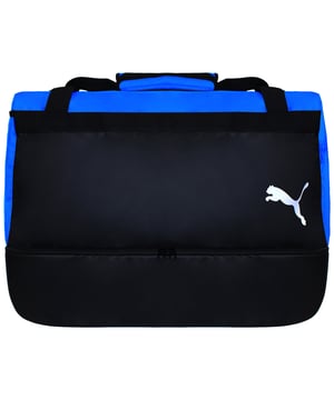 The Puma TeamGoal 23 Black/Blue Hardcase Bag is an excellent choice for athletes who need a reliable and protective bag for their gear. Whether you're heading to a match, training session, or even traveling, this bag is built to keep your equipment safe while offering ample storage space. The hardcase design offers superior protection from bumps and impacts, so you can rest assured that your gear will stay in top condition.
Key Features:
Hardcase Protection: 

The hard shell exterior ensures that your equipment is protected from any rough handling or impacts, which is ideal for transporting delicate or important gear.


Spacious Storage: 

With a generous main compartment, this bag has plenty of space for all your essentials, including clothes, boots, balls, and accessories. There are also additional side pockets to keep smaller items organized.


Durable and Stylish: 

Made from durable materials, this bag is built to withstand wear and tear. The sleek black and blue color combination gives it a modern, sporty look, perfect for any athlete who wants to showcase their style.


Comfortable Carrying: 

The bag is equipped with adjustable shoulder straps and a carry handle, making it easy to carry whether you're rushing to the field or traveling to a tournament.