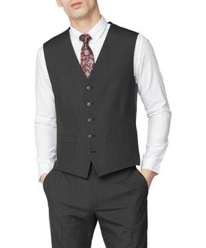 Five button front Limehaus Waistcoat with a back adjuster to tailor the perfect fit. Limehaus is a true trendsetter in menswear, this sophisticated charcoal waistcoat is a stylish slim fit, perfect for every dress code. Style with the matching jacket and trouser, the perfect look for any occasion.