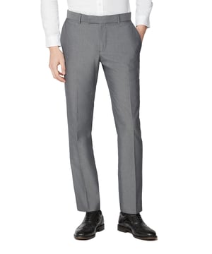 Update your formalwear collection with the 'Light grey tonic slim fit suit trousers' from Limehaus. Limehaus prides itself on being at the forefront of fashion in menswear, this sophisticated Light grey tonic suit is a stylish slim fit, suitable for all occasions. The suit trouser features a plain front and zip fly fastening with double hook and bar. This suit offers traditional styling with a modern and contemporary edge, pair with the matching jacket and waistcoat, the perfect ensemble for day and evening.