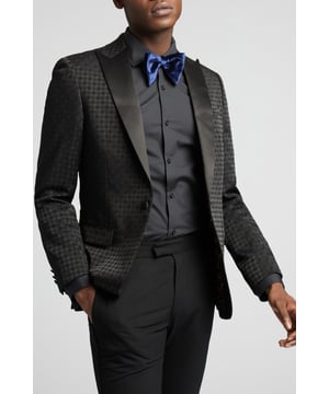 Contemporary design meets heritage influence with Antique Rogue. Designed for the true trendsetter, an eye-catching colour palette spans across checked fabrics, bright plaids, and textures that elevate suits, shirts, and more. Antique Rogue's unique suits combine legendary British tailoring with distinctive styling, coming together to create a timeless range that can be dressed up or down.