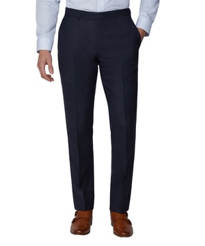 Update your formalwear collection with the 'Texture Tailored Fit Trouser' from Racing Green. The trouser is styled with a plain front and zip fly fastening with hook and bar. This contemporary trouser is a transitional piece that will take you from wedding to weekend. Wear smart with matching jacket, button down Oxford shirt and brogues, or casual with t-shirt and trainers.