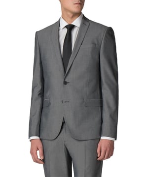 Update your formalwear collection with the 'Silver Grey Tonic Skinny Fit Jacket' from Limehaus. The jacket is styled with a 2-button fastening, notch lapel and 4 button cuffs. This contemporary jacket is a transitional piece that will take you from wedding to weekend. Wear smart with matching trousers, a button down Oxford shirt and black brogues, or casual with grey t-shirt and trainers.