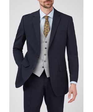 This slim fit navy suit jacket features a classic design, with notch lapels and a two button fastening - ideal to wear with the matching trouser and waistcoat to create a unique two piece suit for any occasion, or worn as a smart casual blazer with jeans or chinos.Featuring the Limehaus seal of quality, this comfortable, smart fit suit boasts a contemporary twist on traditional styles, with a natural flair that''s perfect for any occasion.
