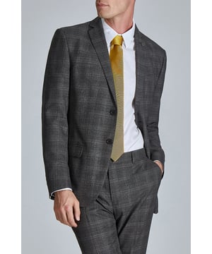 The ultimate in formal style, this Ted Baker charcoal check suit jacket has a fine texture and highlight rust check. Cut in a slim fit for a contemporary feel, then finished with Ted''s signature magnolia lining and lapel pin. Pair this with the matching suit trouser.