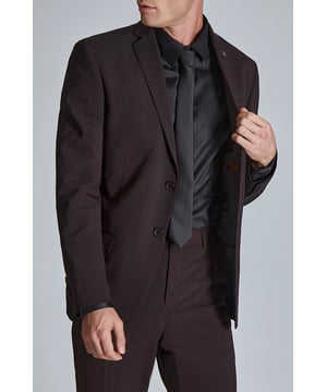 Make a statement at your next event with Ted Baker''s burgundy suit jacket. Cut in a slim fit for a contemporary feel, then finished with Ted''s signature magnolia lining and lapel pin. Pair this with the matching suit trouser.