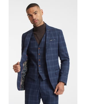 Effortlessly sharp, this navy tweed checked suit jacket features notch lapels, a two button fastening and a trademark slim fit, matched up with a statement lining.A classic suit by Antique Rogue, inspired by a rock and roll attitude and a more rebellious feel for menswear.