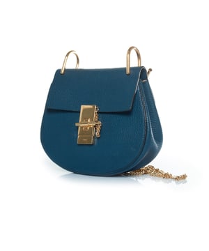 VINTAGE, RRP AS NEW
Chloe, blue leather drew bag. The item is in very good condition. 
 CONDITION: very good condition

SIZE: small

MEASUREMENTS: height 17 cm, width 19 cm, depth cm, height handle 6 cm, length strap 106 cm

MATERIAL: grained leather

CARE: specialist leather treatment

COLOR: blue, gold Measurments:  width: 190 mm height: 170 mm strap length: 1060 mm
