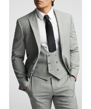 A classic recapture of British tailoring - Alexandre of England present the Ice Grey Check tailored fit suit jacket. Made in a luxurious wool blend, for guaranteed comfort and style for your next formal occasion.With a sleek single-breasted, one button fastening, this jacket also features a peak lapel, 2 straight flap pockets and printed lining for added impact.Pair with the matching trousers and waistcoat for head-to-toe sophistication.