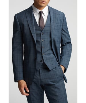 A classic recapture of British tailoring - Alexandre of England present the Blue Soft Check tailored fit suit jacket. Made in a luxurious wool blend with added stretch, for guaranteed comfort and style for any occasion.With a single-breasted, two button fastening, this jacket also features notch lapels, 2 straight flap pockets and tonal printed lining for added impact.