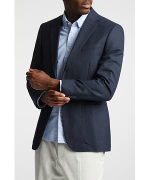 A classic recapture of British tailoring - Alexandre of England present the Navy Hopsack standalone jacket. Made with pure wool, for guaranteed comfort and style for any occasion.With a sleek single breasted, two button fastening, this jacket also features a notch lapel, patch pockets and printed buggy lining for added impact.Perfect for pairing with a tshirt and chinos for a sleek smart-casual look, or with a sharp shirt for effortless formalwear dressing.