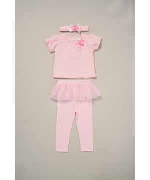 This Charming Ribbon Detail Top and Tutu Leggings Set from Rock A Bye Baby Boutique features a sweet top adorned with a lovely rose ribbon, paired with tutu leggings for an extra touch of sweetness. The matching headband, also decorated with a rose ribbon, completes the look. Each set comes with a hanger for easy storage and display. Dress your little one in style and comfort with this adorable set from Rock A Bye Baby Boutique.