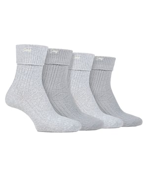 Jeep Ladies 4 Pack Turn Over Top Boot Socks: Introducing the Jeep Super Soft Turn Over Top Boot Socks, a delightful twin-packed set designed for ultimate comfort and cosiness. Crafted from 97% Polyester and 3% Elastane, these crew length ladies' socks boast a silk-like feel and are exceptionally breathable. The medium thickness, ribbed legs, and standard toe seams add to their appeal, making them a perfect match for ankle-length boots. With a charming Jeep embroidery on the turn over top cuffs, these socks come in complementing plain and marl colours. Their enhanced decorative ribbed pattern exudes elegance and style. Despite the thick knit, these socks efficiently release moisture and allow air movement, ensuring your feet stay comfortable throughout the day. Machine washable at 40°, these Jeep Super Soft Turn Over Top Boot Socks offer unbeatable softness and warmth, making them a must-have addition to your sock collection. Treat your feet to a luxurious experience with these indulgent socks. Extra Product Details: Made of 97% Polyester, 3% Elastane - silk-like feel, highly breathable. Perfect fit for ankle-length boots, medium thickness, ribbed legs. Charming Jeep embroidery, complementing plain & marl colors. Elegant ribbed pattern, moisture-wicking & airflow design. Machine washable at 40°, unbeatable softness & warmth. Luxurious experience for your feet, a must-have addition to your collection.