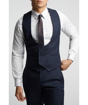 A classic recapture of British tailoring - Alexandre of England present the Navy Textured Check waistcoat. Made in pure wool, for guaranteed comfort and style for any occasion.Pair with the matching jacket and trousers for head-to-toe sophistication.