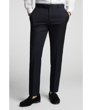 A classic recapture of British tailoring - Alexandre of England present the Navy Chalk Stripe tailored fit suit trouser. Made in pure wool, for guaranteed comfort and style for any occasion.Perfect for pairing with a tshirt and trainers for a sleek smart-casual look, or with a sharp shirt for effortless formalwear dressing.