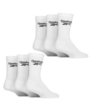 Reebok - 6 Pair Men's & Ladies Core Ribbed Cotton Crew Socks: Reebok Core Ribbed Crew Socks are the perfect addition to your everyday sock collection. With a classic design featuring the iconic Reebok logo, these sporty ribbed leg socks offer a soft, stretchy feel, making them ideal for all-day comfort. The built-in arch support is specially designed to provide a secure, snug fit that conforms to the natural contours of your foot, helping to reduce fatigue and improve stability throughout the day. This makes ribbed socks ideal for maintaining a snug fit around the calf, offering gentle compression that enhances circulation and prevents sagging, which is especially useful during physical activity or long periods of wear. The seamless toe design eliminates the traditional bulky seam found in most socks, reducing the risk of irritation and friction. This feature enhances comfort, particularly during long periods of wear, as it prevents pressure points and chafing around the toes. Ideal for those who prefer an unobtrusive and minimalist style, these socks seamlessly blend into any outfit while maintaining maximum comfort throughout the day. These socks offer a great balance of softness, durability, and flexibility. Available in packs of 6 pairs, they come in Black or White, and three UK sizes: 6-8, 8-10, and 10-12. Made from a breathable cotton blend with 59% Cotton, 36% Polyester, 4% Elastane, and 1% Polyamide they are also machine washable at 40°, making them easy to care for and perfect for everyday wear. Extra Product Details: Reebok Core Crew Socks Arch Support for Snug Fit Cotton Blend Seamless Toe & Cushioned Sole Ribbed Leg for Comfort Available in Black & White Soft and Breathable 6 Pairs Per Pack 3 UK Sizes: 6-8, 8-10, 10-12 Machine Washable