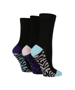 Wildfeet - Ladies 3 Pair Bamboo Socks with Foot Patterns: Smooth, silky and super-soft in beautiful bamboo, these three pairs of Wildfeet Patterned Bamboo Socks are the ideal everyday socks for anyone with delicate or sensitive skin. The mixed colour designs will look good for every occasion. The lightweight and breathable knit combines with moisture-managing and thermoregulating, naturally antibacterial bamboo to give you happier, drier and fresher-feeling feet through your day. Bamboo is eco-friendly and sustainable. Better yet, the packaging for these socks is made using recycled paper. For extra durability, toes and heels have been invisibly reinforced too. They also come in 7 different colours/designs which include: 2 types of Navy, Black, Blue Spot, Yellow Spot, Purple Zebra and Green Zebra. Wild Feet is a range of socks featuring cool designs, bold colours and quirky catchphrases - from pugs and penguins, to lions and llamas! . There are 7 colours to choose from: Black, Navy, Yellow, Blue, Green & Purple. They come in one size Ladies 4-8 UK, are made from 70% Viscose (from Bamboo), 28% Polyester, 2% Elastane and are machine washable. Extra Product Details: Ladies Wildfeet Patterned Socks Cute Foot Patterns Super Soft Bamboo Fibres 7 Colours/Design Options Made For Everyday A Great Gift Idea The Ideal Stocking Filler Soft & Breathable One Size: 4-8 UK Machine Washable