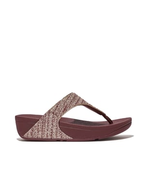 FitFlop's bestselling Lulu sandals boast a timeless triangular vamp  softly padded uppers  and a soft microfibre toe post. Featuring FitFlop's Microwobbleboard™ midsoles for unbeatable comfort. This season  in a sparkling  finely ribbed  glitz mesh (with metallic pearlised faux-leather side panels for extra lustre). Beautiful. Versatile. The sophisticated shimmer means these work with multiple looks - dress yours up or down  wear day through to night.Ergonomically engineered to help optimize your body's alignment  natural movement & energyLight pressure-diffusing Microwobbleboard midsole - triple-density cushioning follows 3 footstep stages (firm heel-soft middle-medium at toes)Natural arch supportAverage to wide fitGrip level 1 - everyday use-road treadThese shoes have been granted the APMA* Seal of Acceptance  for footwear found to promote good foot health*American Podiatric Medical Association