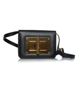 VINTAGE, RRP AS NEW
Tom Ford, Natalia crossbody bag in black. Hardware has scratches and leather a few as well. Comes with dustbag.
 CONDITION: good condition

MEASUREMENTS: height 16 cm, width 20 cm, depth 5 cm, length strap 120 - 155 cm

MATERIAL: leather

CARE: specialist leather treatment

COLOR: black Measurments:  width: 200 mm height: 160 mm strap length: 1200 mm