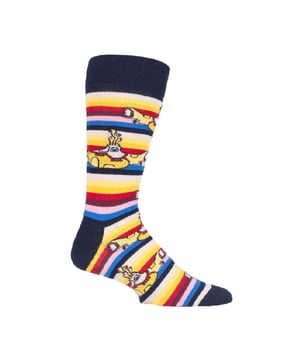 Happy Socks The Beatles Socks: Happy Socks are a popular brand providing a high-quality sock that combines unique designs and craftsmanship. Mikael Söderlindh and Viktor Tell had a vision to spread happiness by turning an everyday essential into a colorful design piece. In 2008, socks were just socks. White, grey and black pieces of textile that were nowhere close to the fashionable and creative design piece they could become. The world’s most comfortable and colorful tool for spreading happiness was born. This concept is now brought to life by Happy Socks’ talented team of creatives. Today, Happy Socks has reached 90 countries and every continent. With Concept Stores all around the world, from LA to Tokyo, Happy Socks can be found in over 10,000 top fashion apparel boutiques. Add a splash of colour and fun with these funky design Beatles Socks! Whether you're a fan of the Fab Four, or you're looking to purchase Beatles products for a loved one, there's something for everyone with our range of The Beatles Socks. The Yellow Submarine socks are striking in colour with their striped patterns. They come in a pack of 1 pair. They are machine washable at 40. They are made from 86% Cotton 12% Polyamide 2% Elastane. Extra Product details: - The Beatles Socks by Happy Socks - Yellow Submarine - Revolver Socks - Abbey Road Crossing - 1 Pair Pack - Machine washable at 40 - 86% Cotton 12% Polyamide 2% Elastane