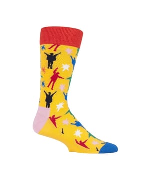 Happy Socks The Beatles Socks: Happy Socks are a popular brand providing a high-quality sock that combines unique designs and craftsmanship. Mikael Söderlindh and Viktor Tell had a vision to spread happiness by turning an everyday essential into a colorful design piece. In 2008, socks were just socks. White, grey and black pieces of textile that were nowhere close to the fashionable and creative design piece they could become. The world’s most comfortable and colorful tool for spreading happiness was born. This concept is now brought to life by Happy Socks’ talented team of creatives. Today, Happy Socks has reached 90 countries and every continent. With Concept Stores all around the world, from LA to Tokyo, Happy Socks can be found in over 10,000 top fashion apparel boutiques. Add a splash of colour and fun with these funky design Beatles Socks! Whether you're a fan of the Fab Four, or you're looking to purchase Beatles products for a loved one, there's something for everyone with our range of The Beatles Socks. The Yellow Submarine socks are striking in colour with their striped patterns. They come in a pack of 1 pair. They are machine washable at 40. They are made from 86% Cotton 12% Polyamide 2% Elastane. Extra Product details: - The Beatles Socks by Happy Socks - Yellow Submarine - Revolver Socks - Abbey Road Crossing - 1 Pair Pack - Machine washable at 40 - 86% Cotton 12% Polyamide 2% Elastane