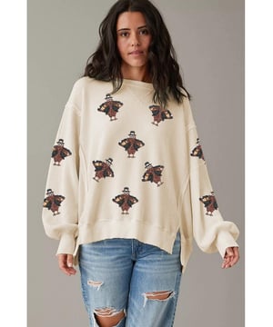 Witte Thanksgiving Kalkoen Waffle Oversized Gebreide Top Paillettenprint schittert in het licht Oversized ontwerp voor een comfortabele pasvorm Verlengen puffmouwen voor extra stijl Splitsdetails op de mouwen Lange mouwen pullover Materiaal: 60% Katoen 40% Polyester