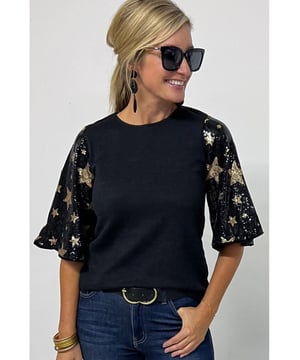 Top de punto a la moda  
Cuello redondo relajado  
Mangas en contraste  
Mangas farol con lentejuelas y estrellas  
Versátil para diferentes ocasiones  
Disponible en diferentes tallas  
Material de alta elasticidad  
Envío rápido a nivel mundial  
Unisex  