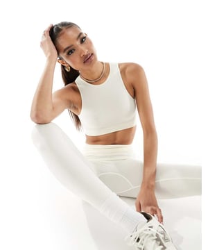 Tops by Missyempire Part of a co-ord set Leggings sold separately Plain design Round neck Racer back Cropped length Skinny fitSold By: Asos