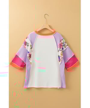 Stylische Wahl für einen lässigen Look im Frühling und Herbst  
Farbblockdesign mit floralen Drucken  
3/4-Ärmel mit Rundhals  
Ideal für Übergangszeiten  
Lässt sich gut mit Jeans oder Röcken kombinieren  
Vielseitiges Teil für verschiedene Anlässe  
Material: 95% Baumwolle 5% Elasthan