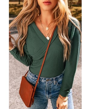 Blackish green waffle knit design
  Slim fit silhouette
  Wrap V
  neck for a touch of elegance
  Comfortable and stretchy fabric
  High elasticity for a perfect fit
  Ideal for day
  to
  night transitions
  Size chart (in inches and centimeters) provided
Material: 60% Cotton 35% Polyester 5% Elastane